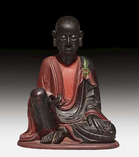 A SEATED LUOHAN.
