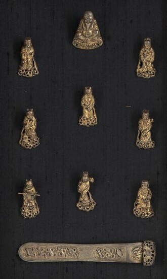 A SET OF CHINESE GILT SILVER 'IMMORTALS' FIGURES AND A