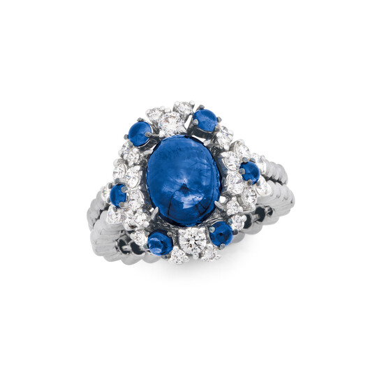 A Sapphire, Diamond and Blackened White Gold Ring