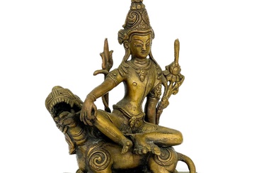 A Tibetan bronze figure of a seated diety, 19th century