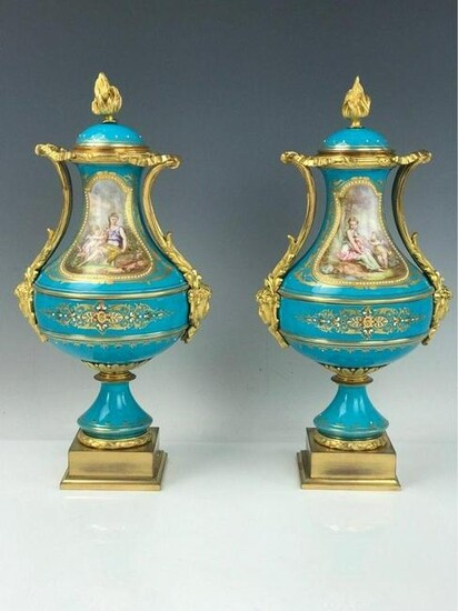 A VERY FINE PAIR OF JEWELED SEVRES VASES