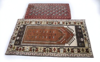 A Western Persian prayer rug with floral flowering plants and...