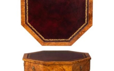 A William IV walnut octagonal writing table