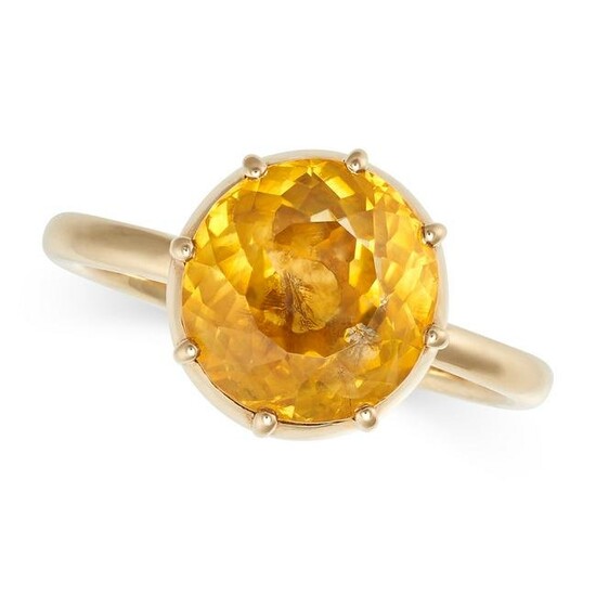 A YELLOW SAPPHIRE RING in 18ct yellow gold, set with a round cut yellow sapphire in a cut down