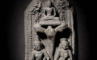 A black stone stele depicting Gomedha and Ambika with a Tirthankara, East India, Pala period, 11th / 12th century