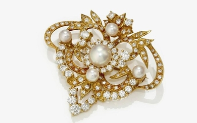 A brooch with brilliant cut diamonds and cultured