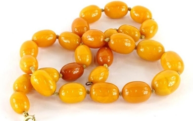 A butterscotch amber bead necklace.