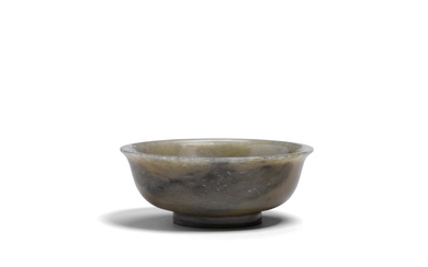 A carved jade footed bowl