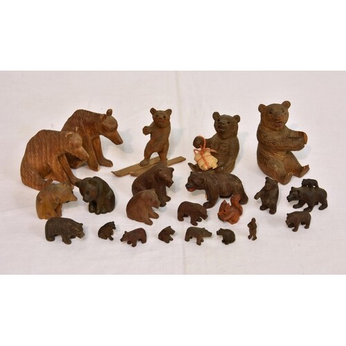 A collection of Black Forest bears, in various poses, to inc...