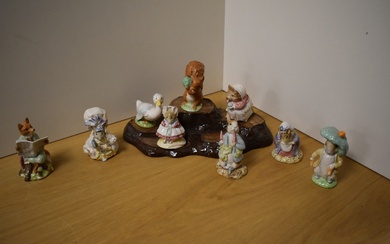 A collection of nine Royal Albert Beatrix Potter figures, to include Benjamin Bunny, Lady Mouse made