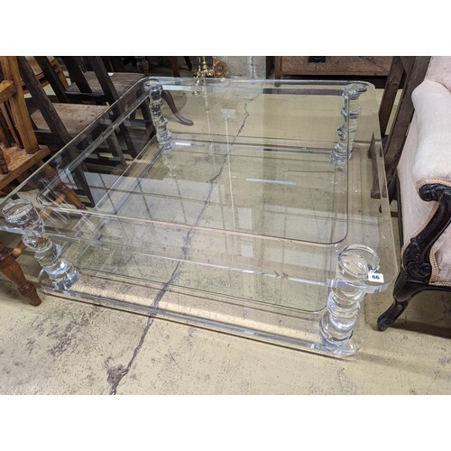 A contemporary perspex and glass square two tier coffee tabl...