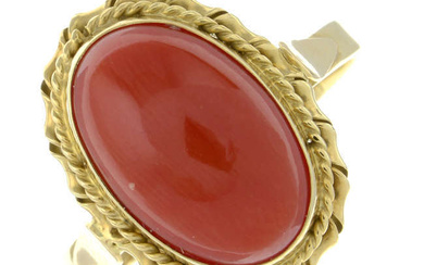 A coral single-stone ring.