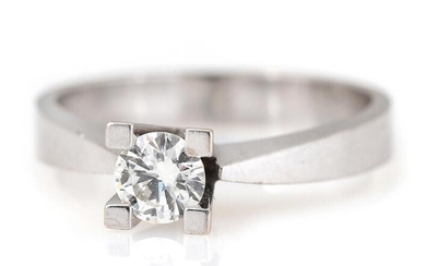 A diamond ring set with a brilliant-cut diamond weighing app. 0.51 ct.,...