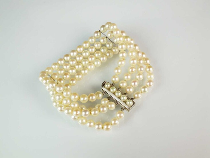 A four strand uniform cultured pearl bracelet
