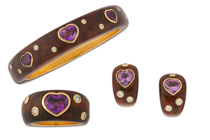 A gem-set wooden bangle, ring and earclip suite...