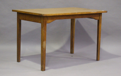 A group of three mid-20th century War Department oak tables, each raised on block legs and bearing p