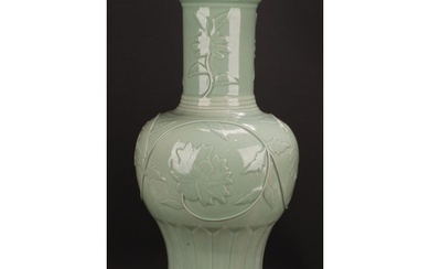 A large Chinese celadon baluster vase, moulded with lotus, 5...