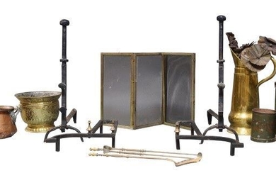 A large pair of wrought iron andirons,...