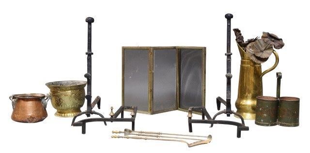 A large pair of wrought iron andirons,...