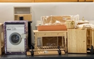 A large quantity of dolls house kitchen items.