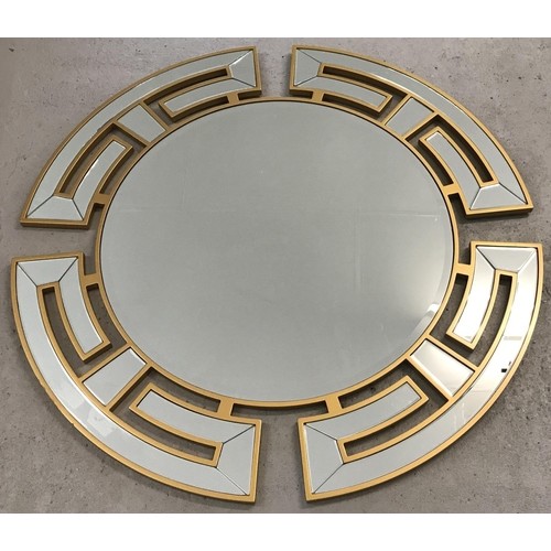 A large round Oriental themed mirror with gilt wooden frame ...