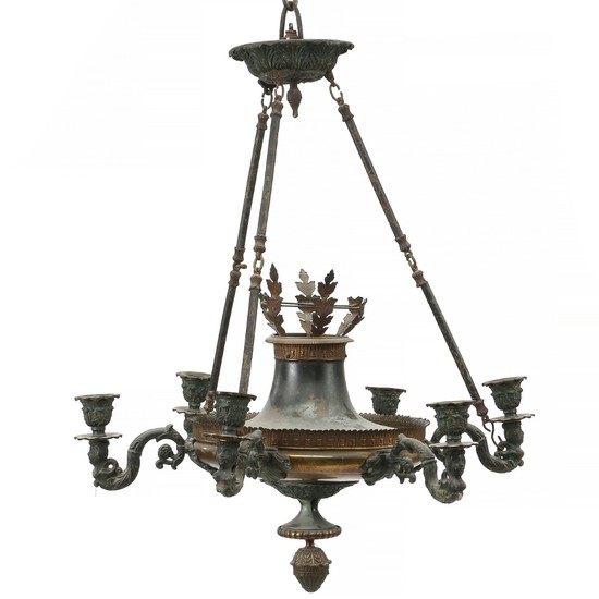 A late 19th century Empire style brass and patinated metal chandelier, six branches. H. 65 cm. Diam. 55 cm.