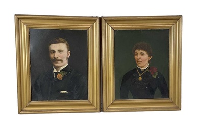 A pair of 19th century oil on board portraits of...