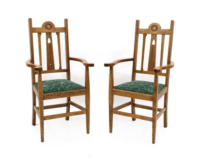 A pair of Arts & Crafts oak armchairs