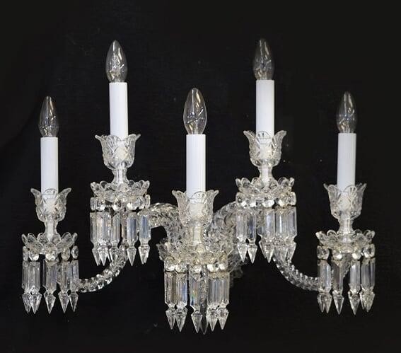 A pair of Baccarat cut and moulded clear glass five light wall appliques