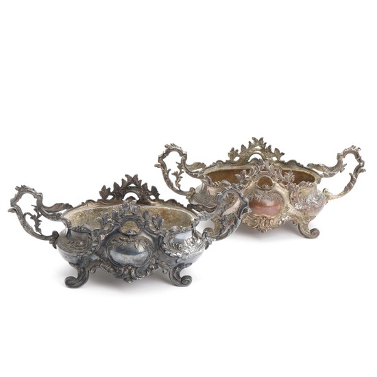 A pair of French partly silver-plated metal jardinières. Rococo style. 19th century. H. 14. L. incl. handles 35 cm. (2)