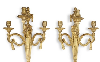 A pair of Louis XVI ormolu three-light appliques circa...