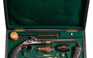 A pair of cased percussion pistols by Peter Schenk of Mariánské Lázné/Marienbad, circa 1850