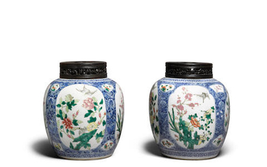 A pair of famille-rose and underglaze blue 'bird and flower' jars