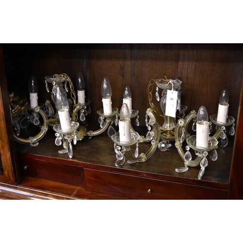 A pair of five light cut glass chandeliers, mid-century, wit...