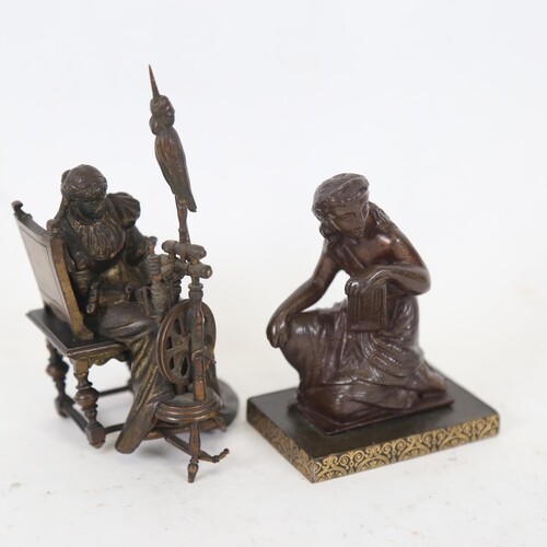 A patinated bronze sculpture, woman at a spinning wheel, uns...