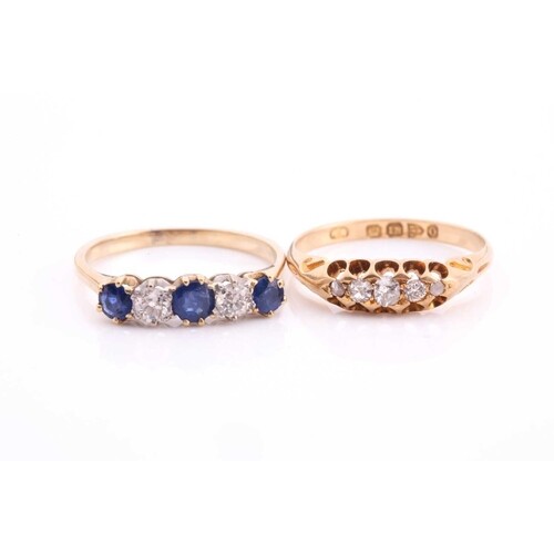 A ring lot consisting of a sapphire and diamond ring and a d...