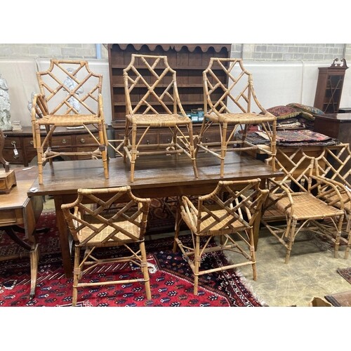 A set of nine caned bamboo chairs, five with arms ...