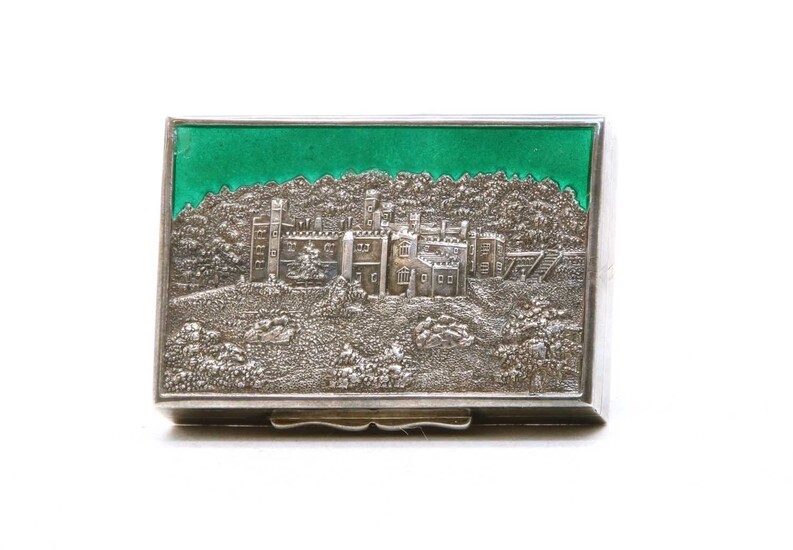 A silver and enamel castle top type snuff box