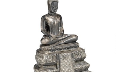 A silvered metal figure of Buddha Shakyamuni. Weight 1600 g. H. 20.5 cm.