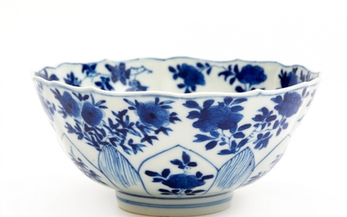 A small blue and white lotus bowl