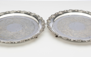 A uniform pair of Hecworth silverplate trays with elaborate embossed...