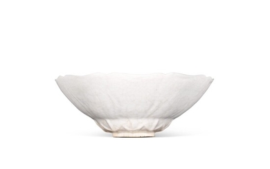 A white-glazed Ding-type mallow-shaped bowl Qing dynasty, 18th/19th century | 清十八/十九世紀 白釉仿定窰葵式盌