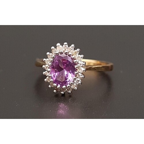 ALEXANDRITE AND DIAMOND CLUSTER RING the central oval cut al...