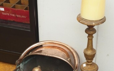 AN ANTIQUE GILTWOOD CANDELSTICK, A COPPER COAL SCUTTLE AND PAIR OF ANDIRONS