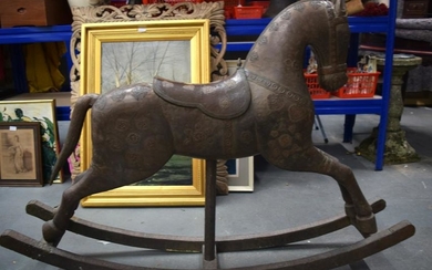 AN ANTIQUE INDIAN COPPER PANEL WOODEN ROCKING HORSE