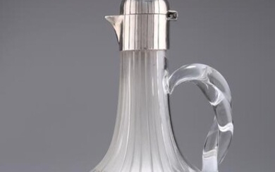 A VICTORIAN SILVER-MOUNTED CLARET JUG, by