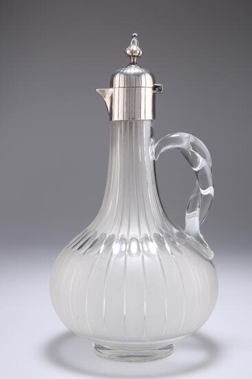 A VICTORIAN SILVER-MOUNTED CLARET JUG, by