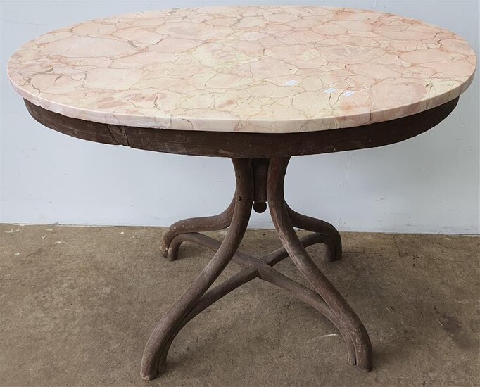 AN OVAL BENTWOOD MARBLE TOP TABLE