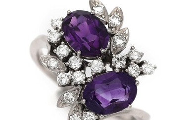 SOLD. Amethyst and diamond ring set with two faceted amethysts and numerous brilliant-cut diamonds totalling app. 0.42 ct., mounted in 18k white gold. Size 58. – Bruun Rasmussen Auctioneers of Fine Art