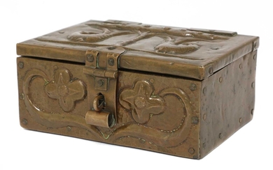 An Arts and Crafts embossed copper casket